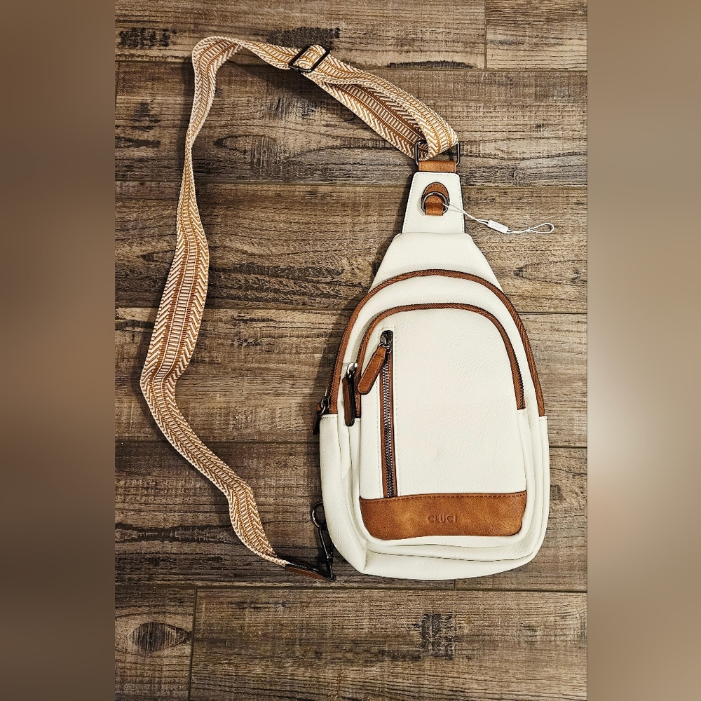 White Crossbody Bag with Adjustable Strap and Modern Design